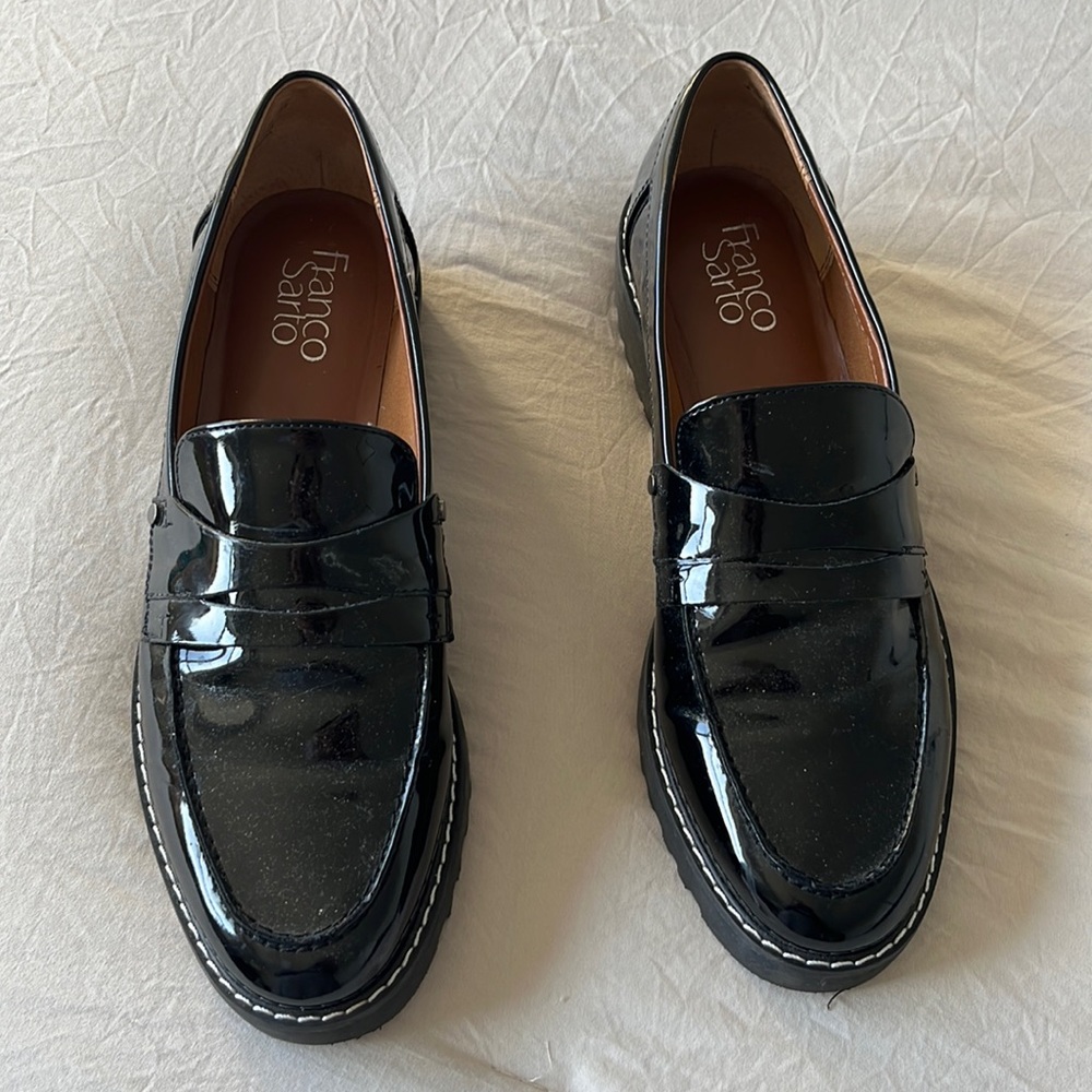 Black patent leather loafer shoes